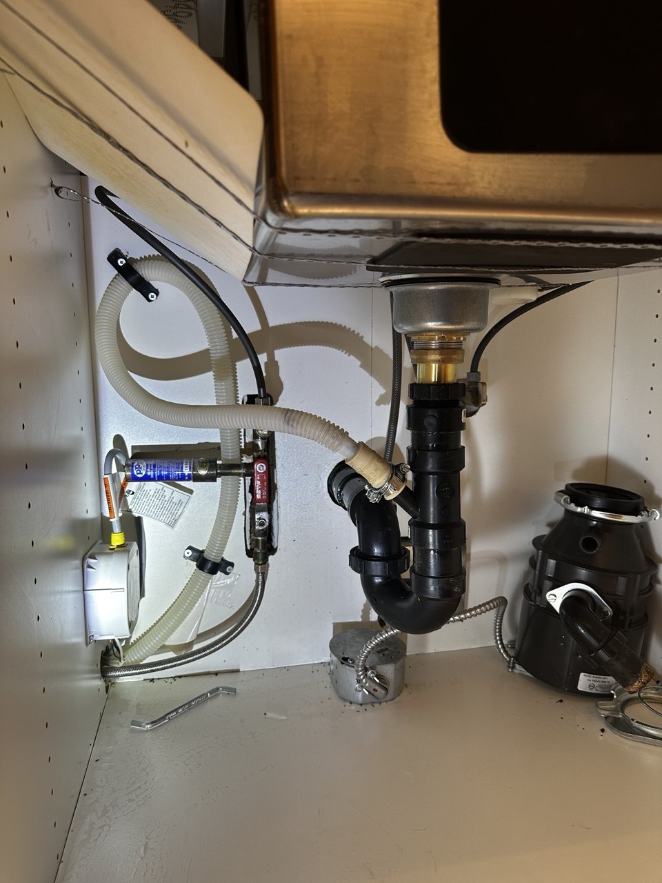 Remove Existing Garburator and Reconfigure Drain Piping